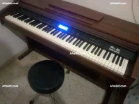 piano ARK-8890 trés bon état