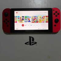 consoles-nintendo-switch-flashe-3232gb-10-jeux-sans-accessoires-etat-810-oran-algerie