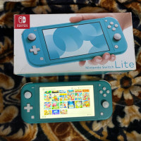 consoles-nintendo-switch-lite-etat-1010-flashe-puce-sd-64gb-avec-boite-et-chargeur-original-oran-algerie