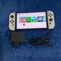 consoles-nintendo-switch-oled-flashee-pucee-190gb-64sd128gb-avec-chargeur-etat-1010-oran-algerie