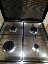 Pack Déménagement : Lave-linge 7kg  (occasion )+ Cuisinière Inox  avec ventilation (occasion ) + Table & 6 Chaises (occasion ) thumbnail 3