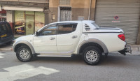 voitures-mitsubishi-l200-4x4-sportero-2013-double-cabine-evolution-bejaia-algerie