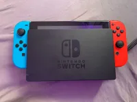 Nintendo Switch + 11 jeux + socle de charge d'origine 