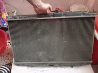 pieces-moteur-رادياتور-نيسان-صني-ب10-radiateur-nissan-sunny-b10-cheraga-alger-algerie