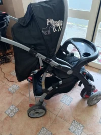 Poussette bébé pingouin 