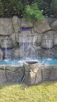 réalisation de fausse roche , fausse pierre et cascade d'eau. إنشاء صخور مزيفة وحجر مزيف وشلال