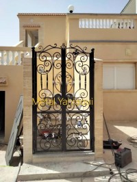 بناء-و-أشغال-porte-metallique-en-fer-forge-مشدا-الله-البويرة-الجزائر