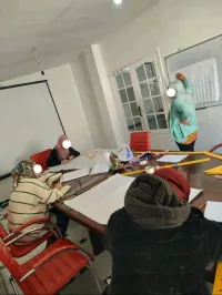 Donne cour de couture 