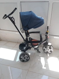 Tricycle + balançoire + trotteur 
