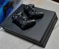 PS4 Pro + 2 manettes + 1 jeu (RDR2) 