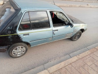 voitures-peugeot-205-1986-كوشي-bejaia-algerie