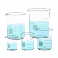 fioles et bécher en verre 