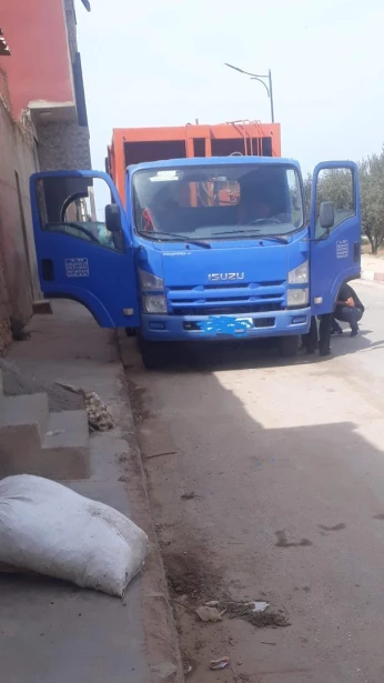 Benne tasseuse Isuzu 2014