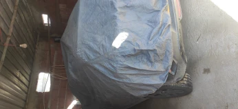 bâche véhicule( غطاء واقي للسيارة)