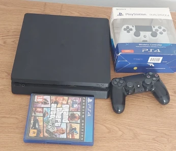 Je vends ma ps4 slim avec 2 manette + cd gta5