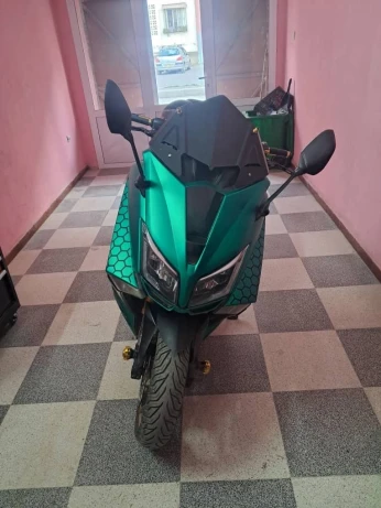 T max