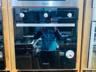 Four encastrable candy noir ( gaz gaz / gaz elct ) ventilé Noir 