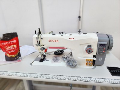 Machine a coudr  bruce double entrainment