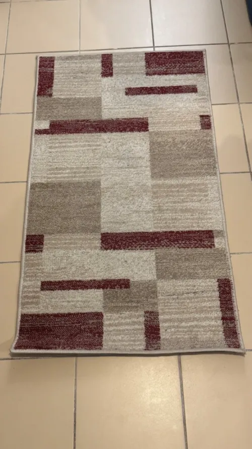 À vendre Lot de 2 tapis assortis en très bon état !
