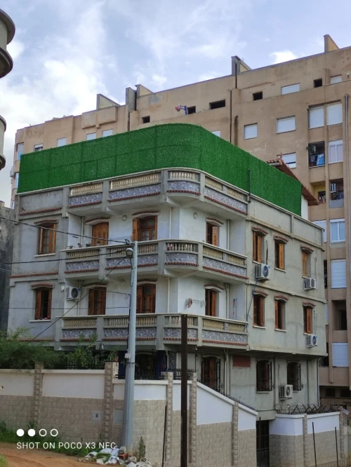 Clôture gazon synthétique