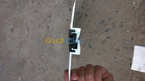 Couvre joint et Joint de dilatation