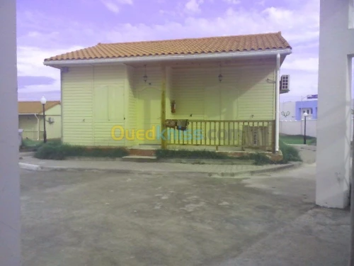 FABRICATION DE CHALETS EN BOIS ROUGE