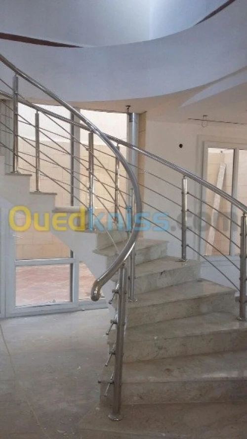 F/p rampe d'escalier en inox et en verre