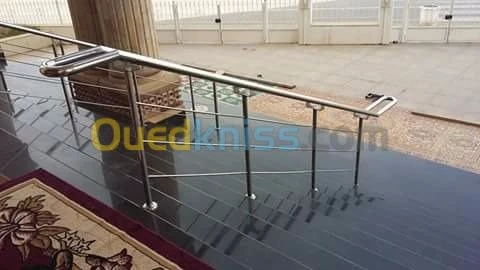 F/p rampe d'escalier en inox et en verre