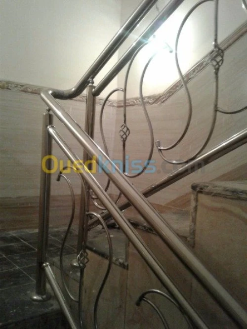 F/p rampe d'escalier en inox et en verre
