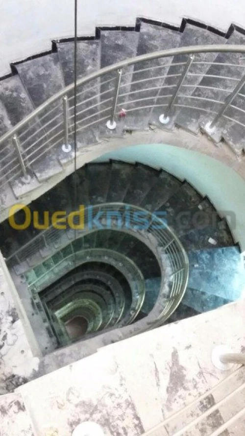 F/p rampe d'escalier en inox et en verre