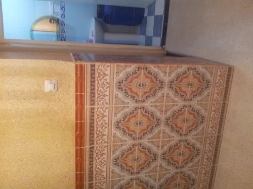 بناء الجدران و تلباس على محييط الخارجي