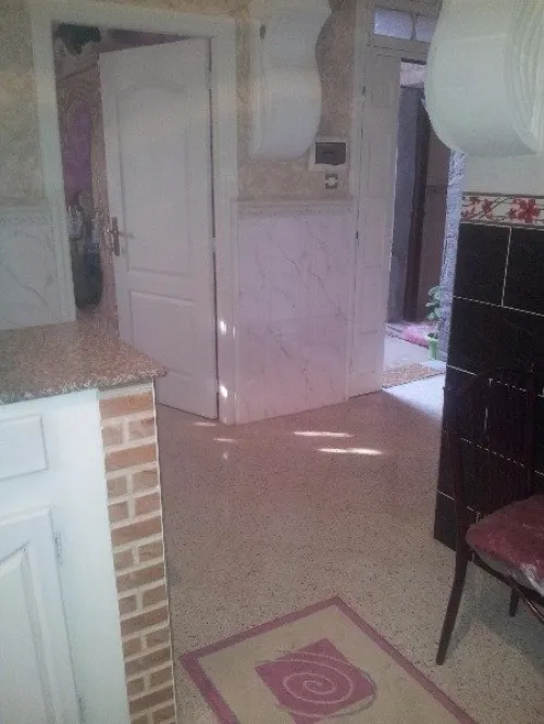 بناء الجدران و تلباس على محييط الخارجي