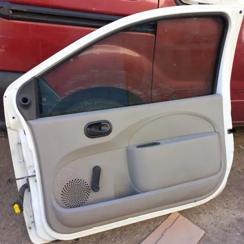 Porte à droite twingo 2013 fina sbigha blache