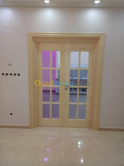 Menuiserie en bois Est