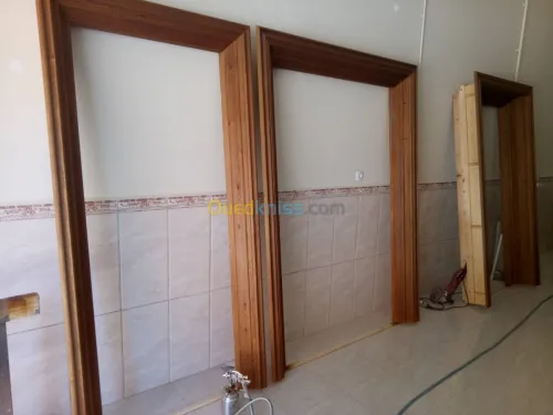 Menuiserie en bois Est
