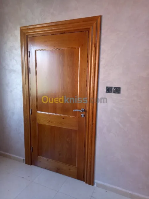 Menuiserie en bois Est