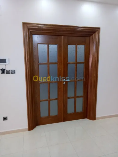 Menuiserie en bois Est