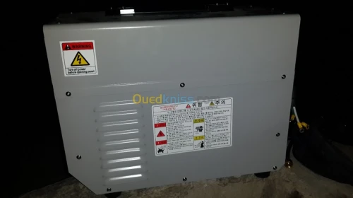* poste à souder et pompe à eau 