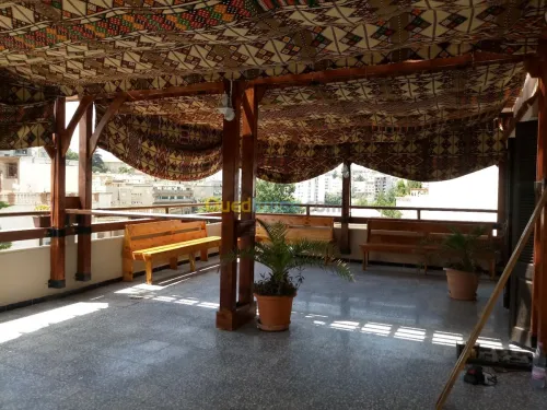 Fabrication et installation de pergola et tinda en bois rouge