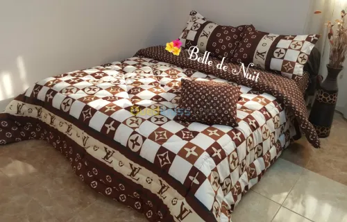 COUETTES ET PARURES DE DRAPS