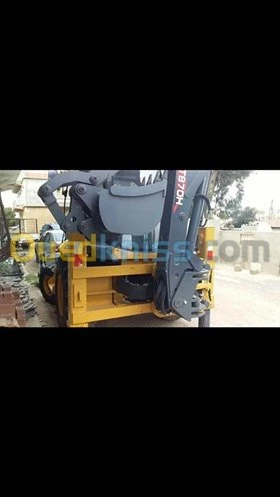 location d'engin retrochargeur xcmg 