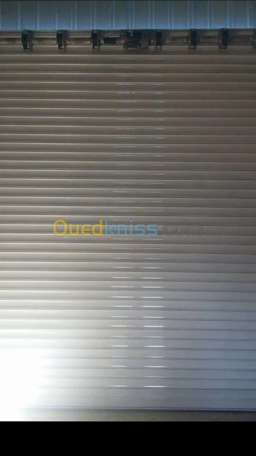 rideaux métalliques électrique