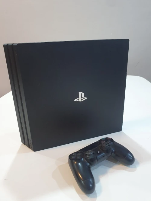 PS4 PRO 1T État Neuf