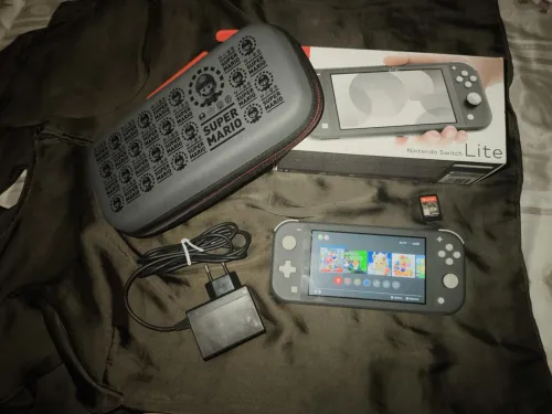 Vends Nintendo switch lite flashé 