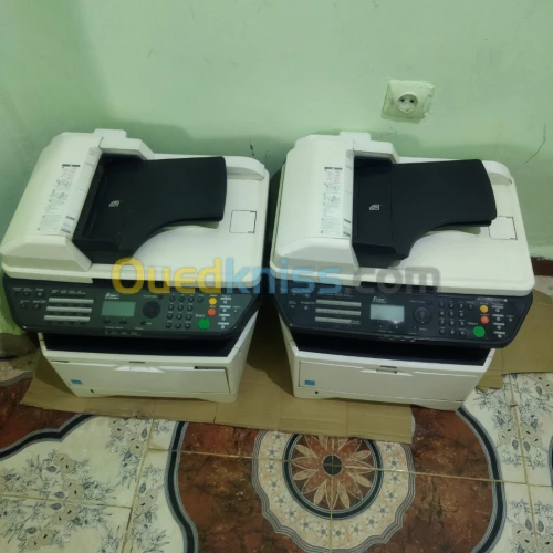 2 photocopies model Kyocera 1030mfp 