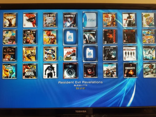 PS3  SUPER SLIM 500G 70 JEUX 3 MANETTE