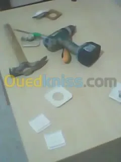 كهربائي électricien