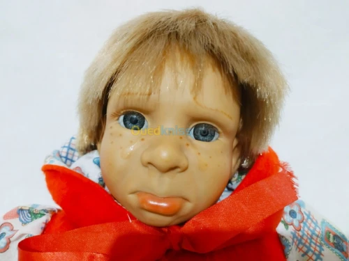 Ancien poupé de colection en porcelain