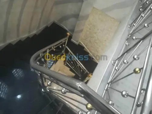 RAMPE D'ESCALIER EN INOX ET VERRE