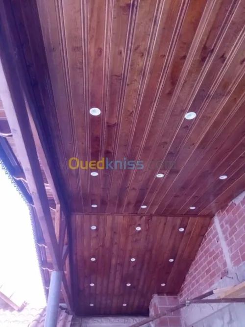 Charpente en bois, tuile et F.P PVC